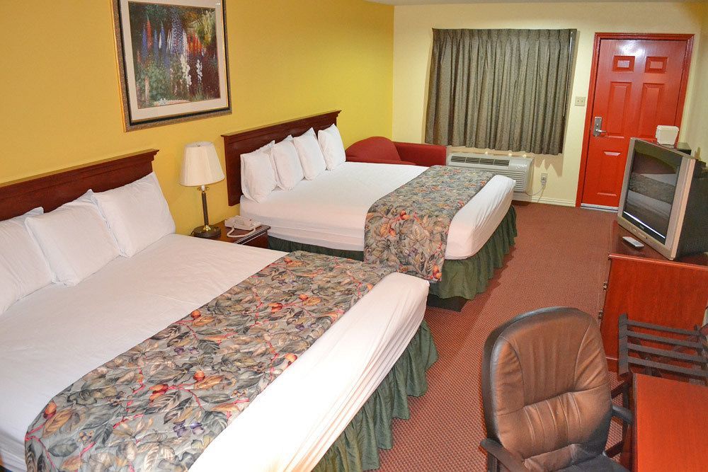 Executive Inn & Suites Магнолия Экстерьер фото