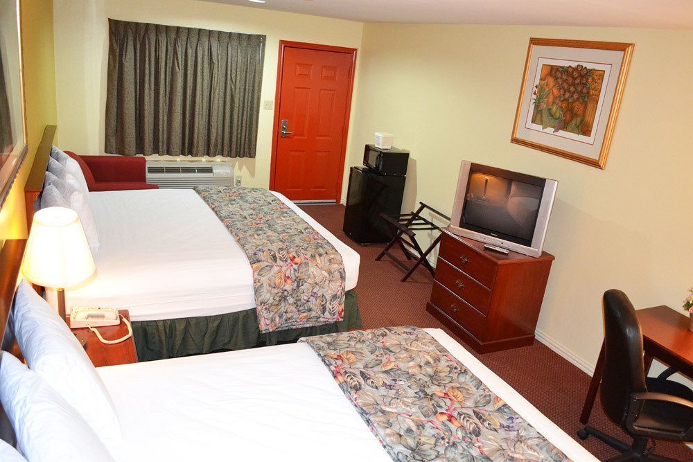 Executive Inn & Suites Магнолия Экстерьер фото