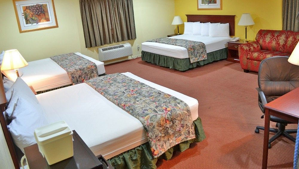 Executive Inn & Suites Магнолия Экстерьер фото